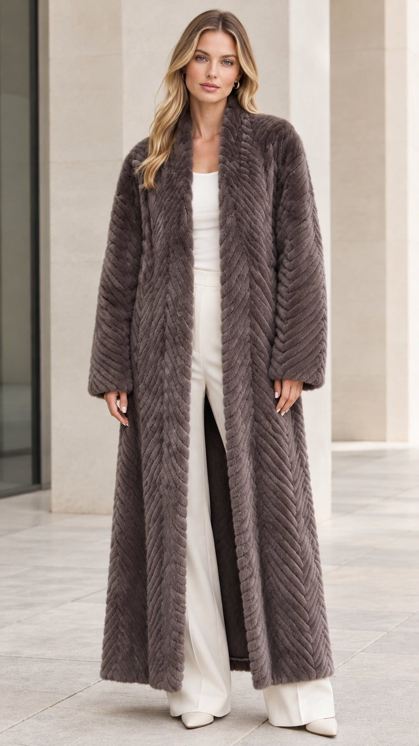 Full front view of model wearing charcoal grey chevron textured faux fur maxi coat
