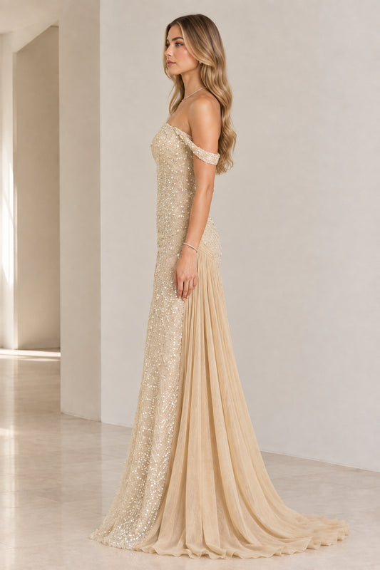 Side profile of champagne off-the-shoulder sequin floor-length formal dress