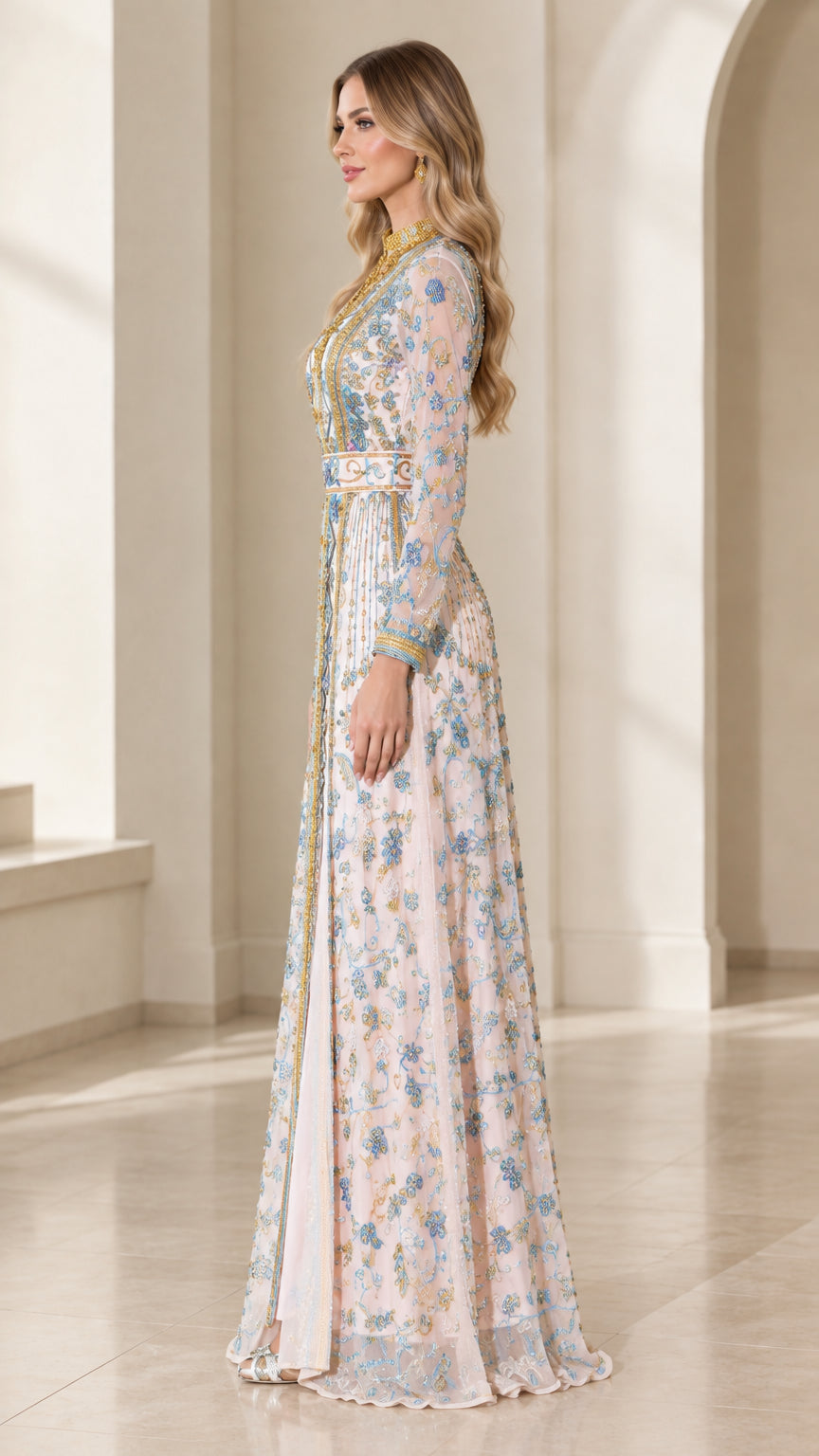 Side profile view of blush pink embroidered long sleeve formal caftan dress