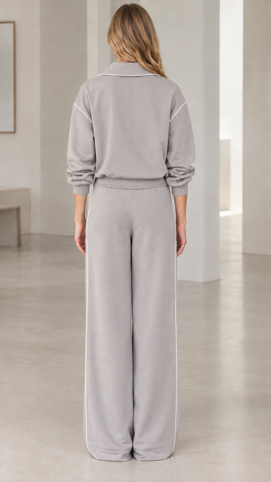 Back view of model wearing Heather Grey wide-leg tracksuit set