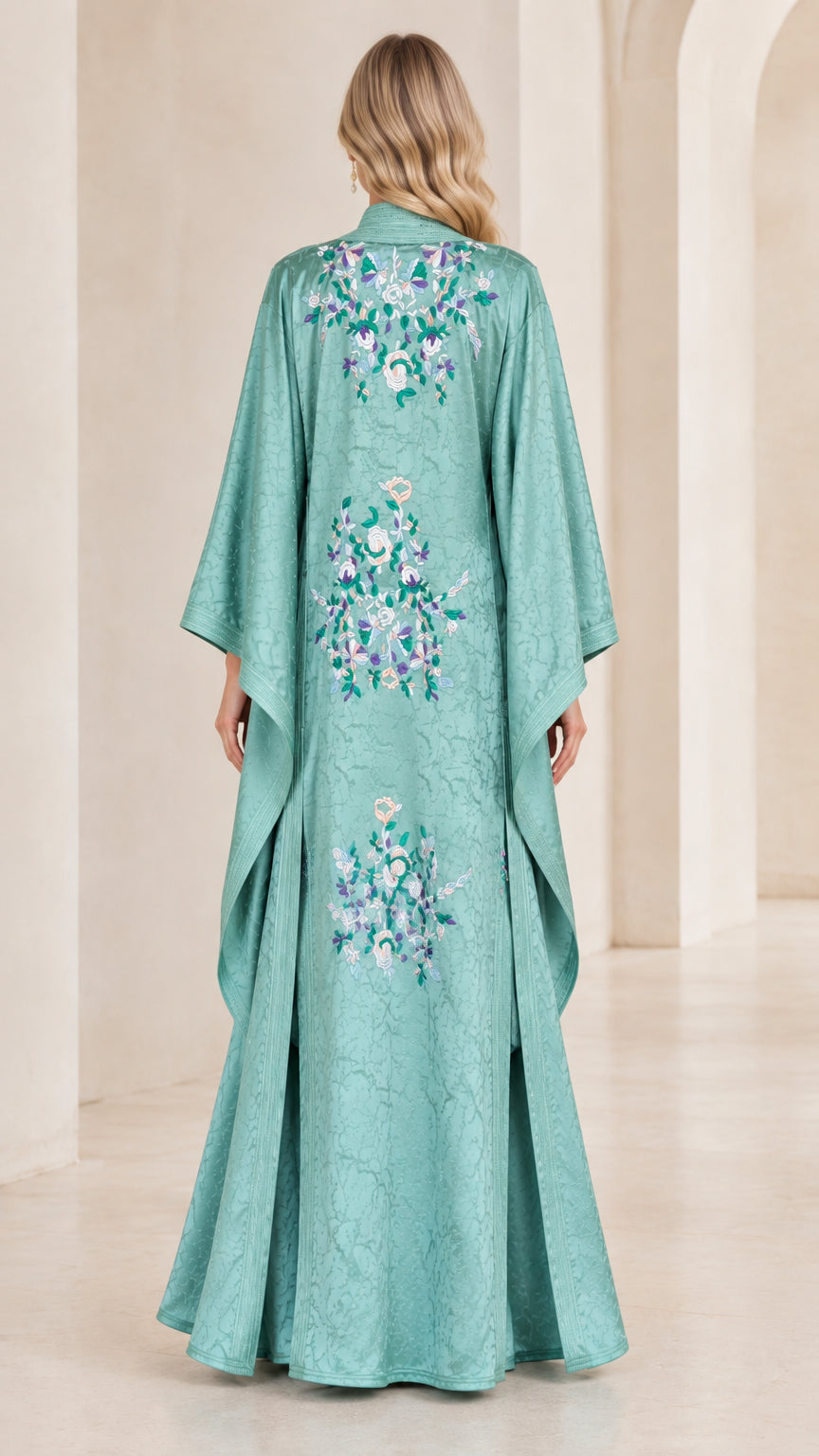 Back view of Sage Green kaftan set showcasing delicate floral embroidery on the duster cape