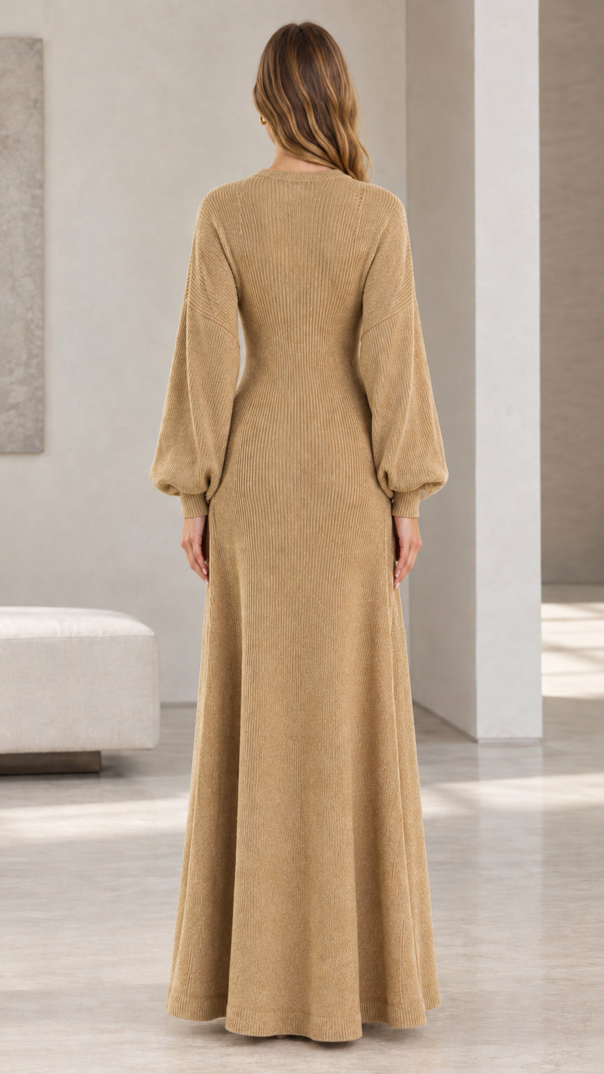 Back view of woman showing fit and drape of camel knit maxi dress and long cardigan set