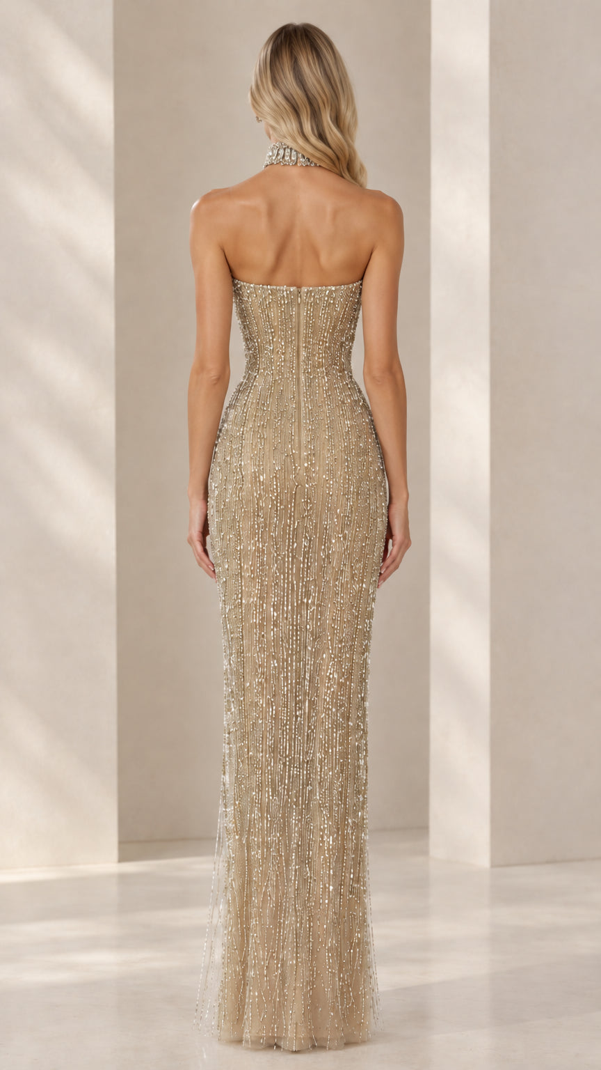 Back view of Champagne Gold strapless beaded evening gown showing sleek silhouette