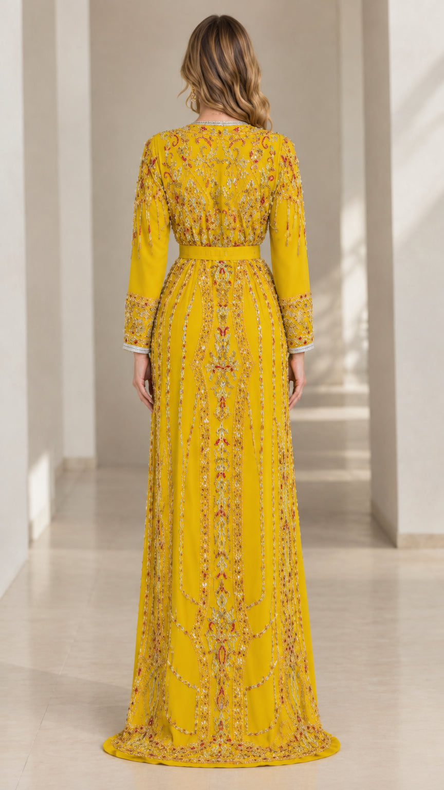 Back view of model in full-length Yellow embroidered formal kaftan gown
