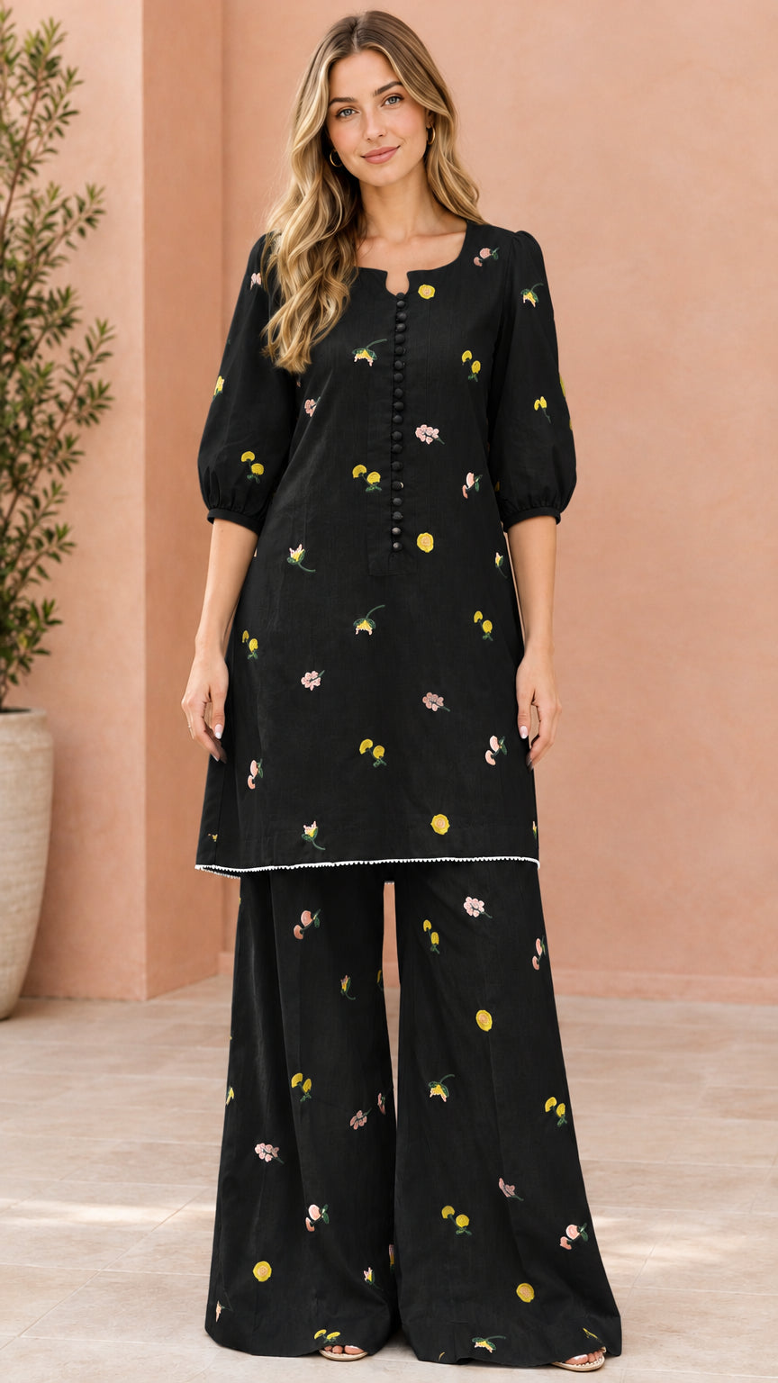 Black floral embroidered tunic top with matching wide-leg trousers
