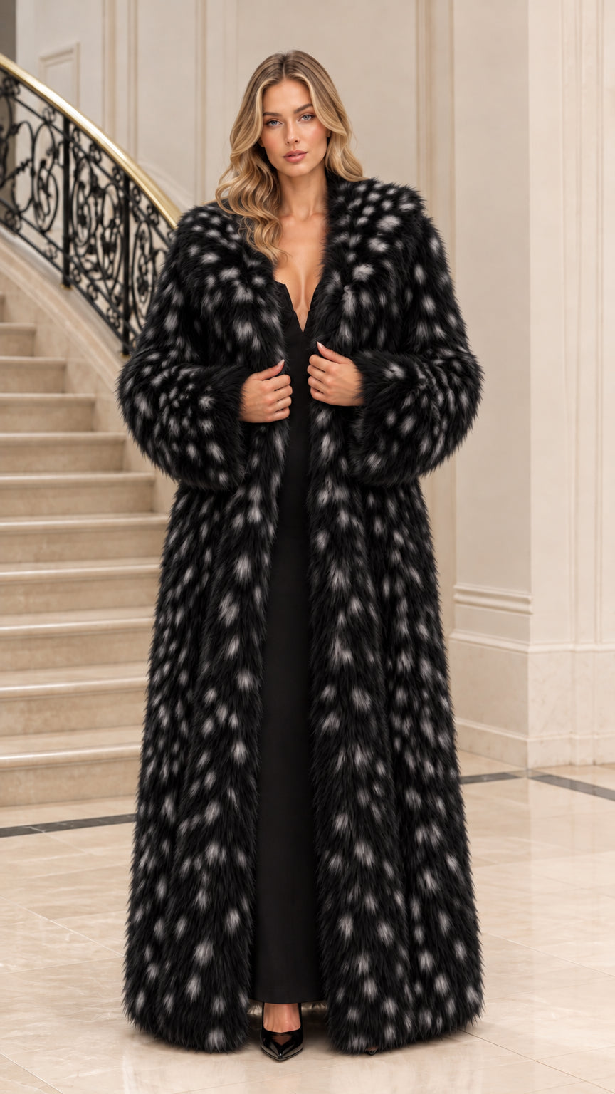 Front view of woman wearing black spotted plush faux fur maxi coat