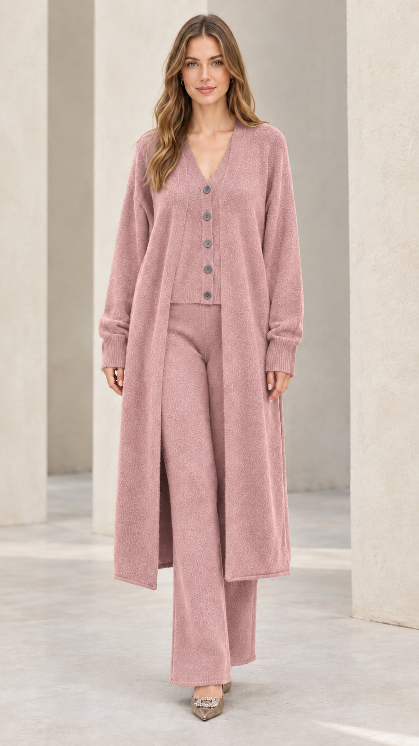 Front full-length view of model wearing dusty pink 3-piece knit cardigan and wide leg pants set