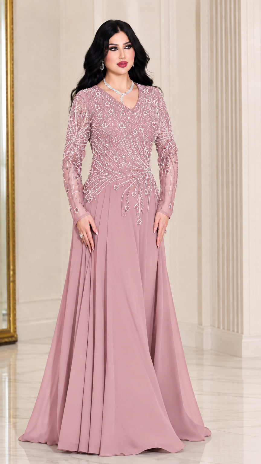 Front view of woman wearing dusty pink long sleeve beaded formal maxi dress