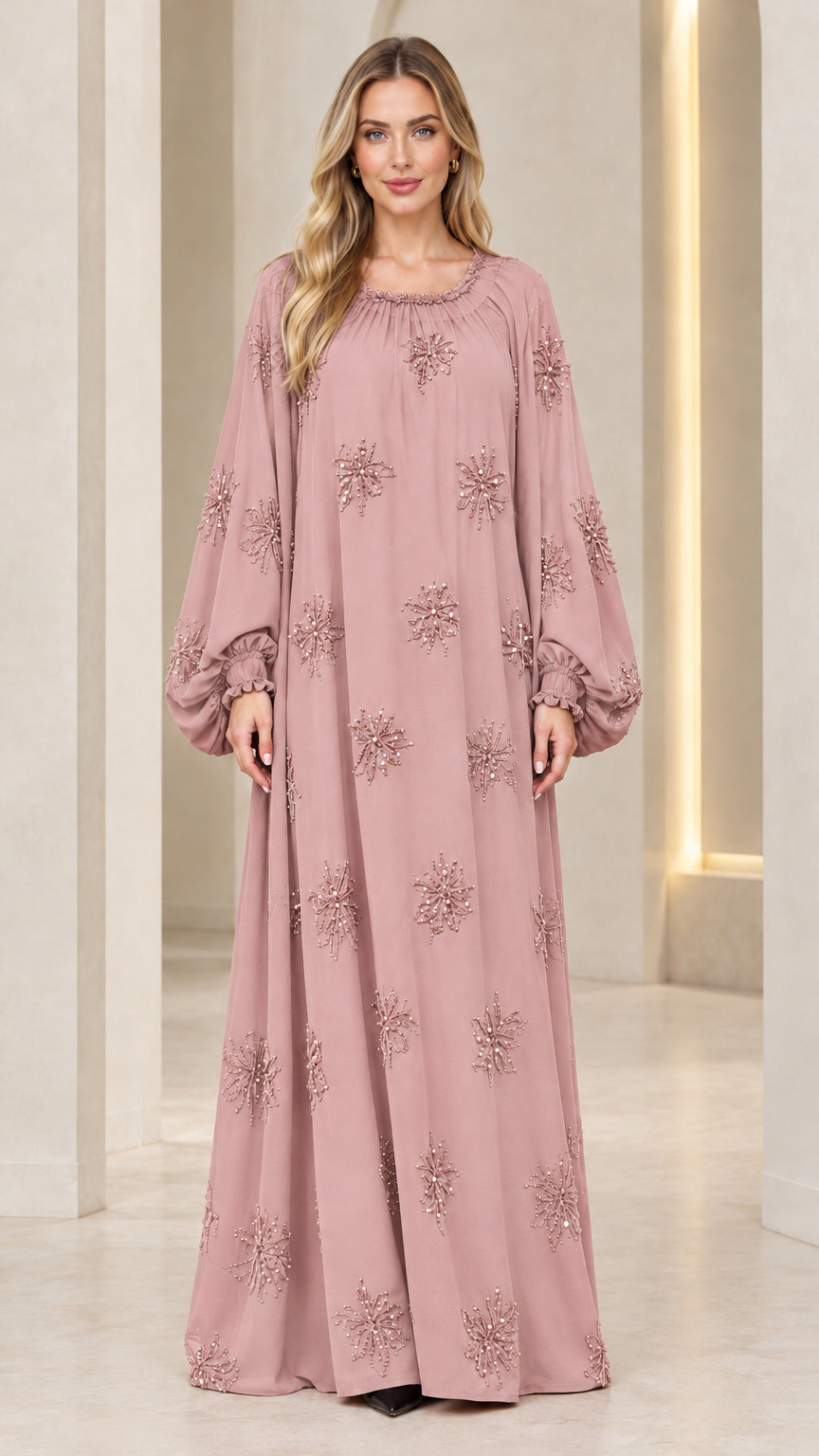 Full-length front view of model wearing dusty pink embellished maxi kaftan dress