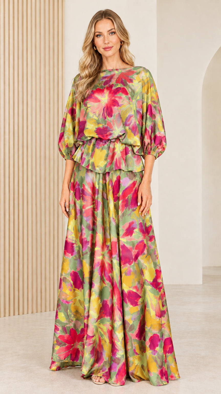 Front full view of woman wearing olive green and pink watercolor floral maxi dress