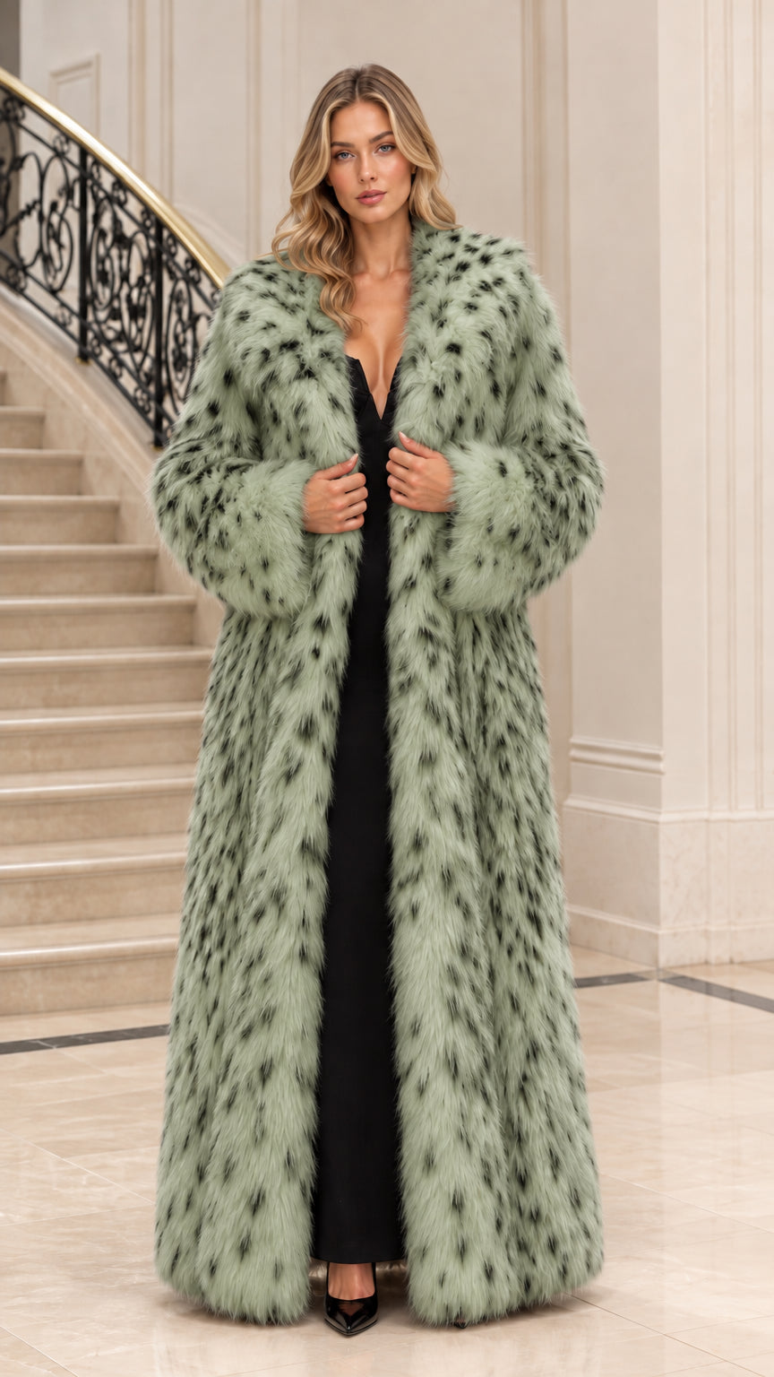 Front view of woman wearing sage green spotted faux fur maxi coat