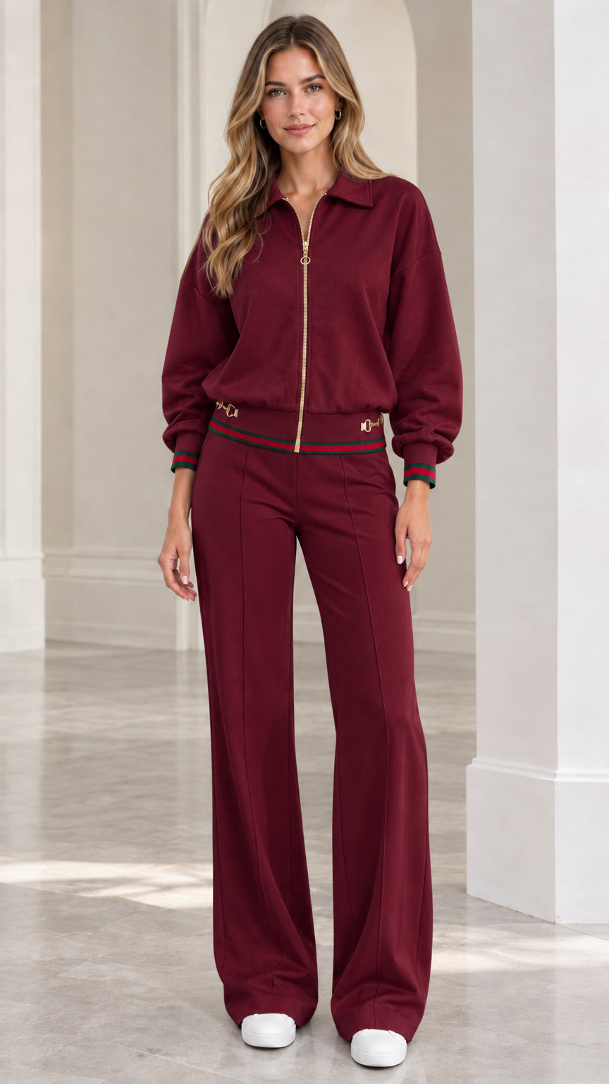 Full front view of women's burgundy collared zip-up tracksuit set with wide-leg pants