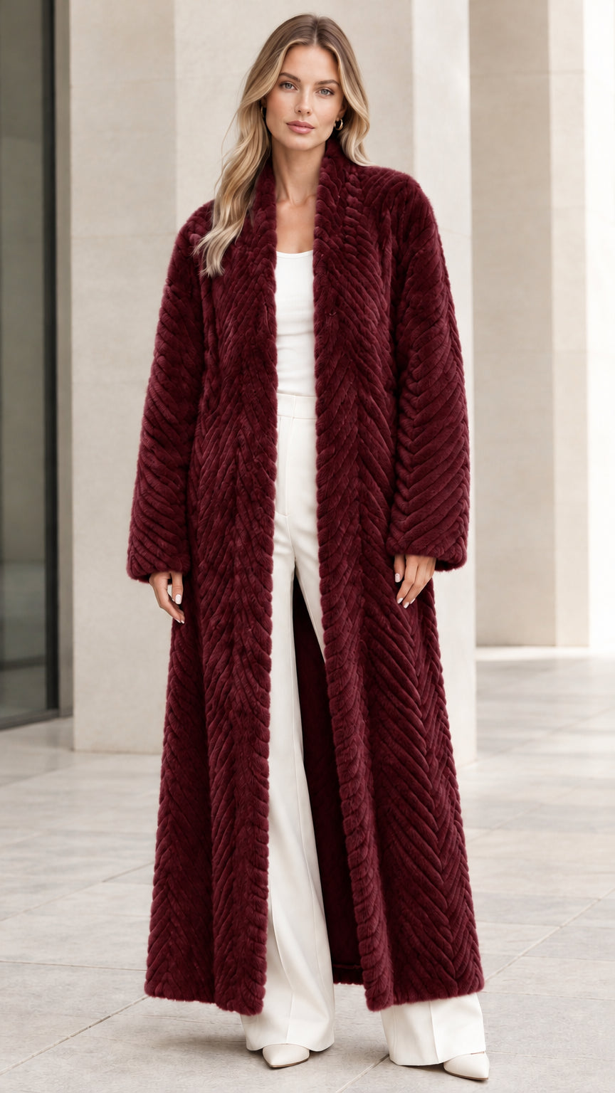 Front view of model wearing burgundy wine red chevron textured faux fur maxi coat