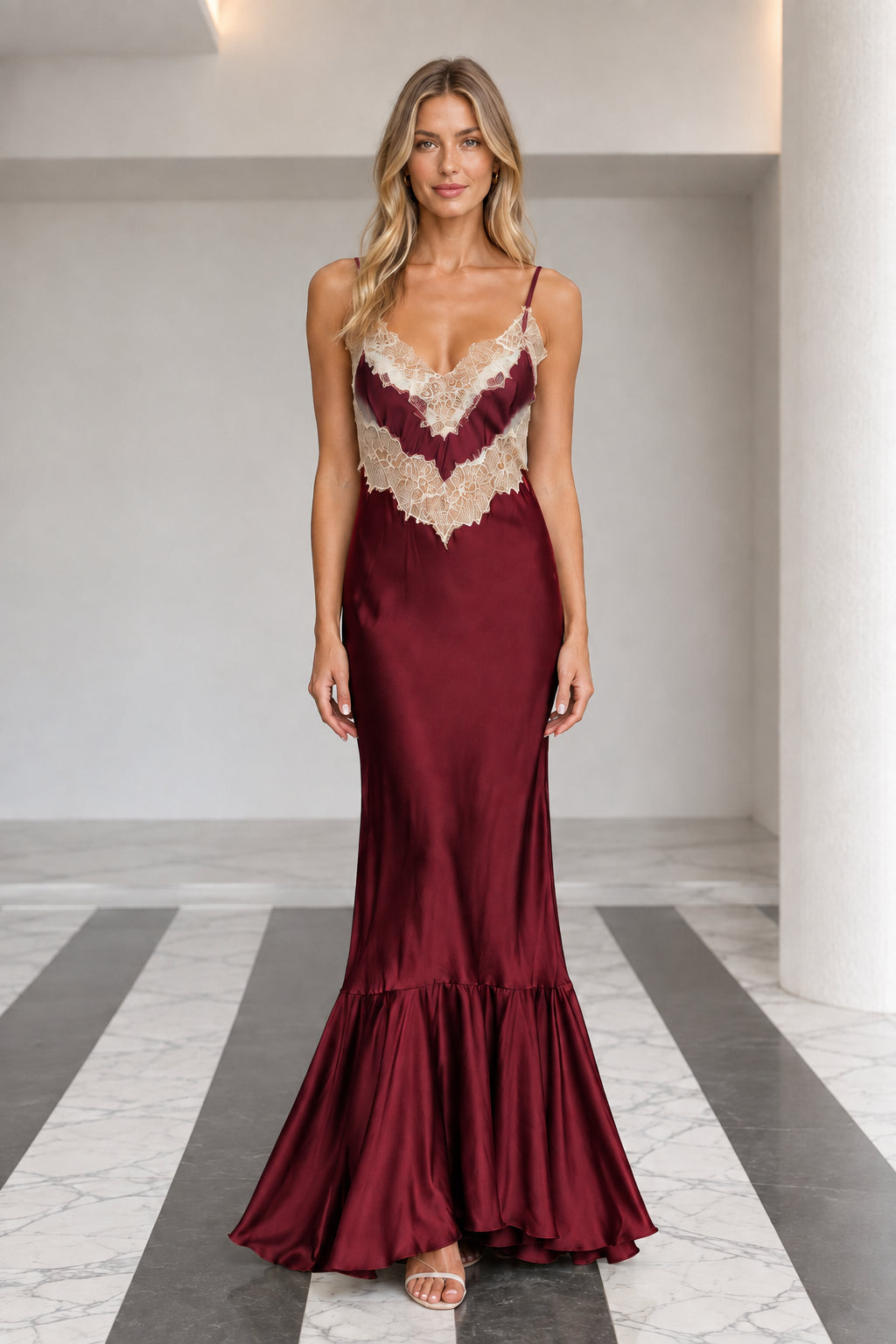 Front view of burgundy wine red satin lace trim maxi dress with trumpet hem