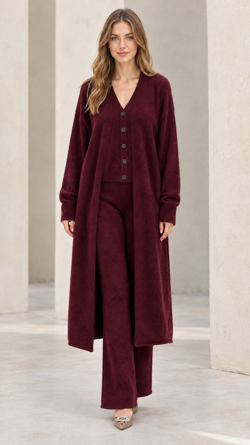 Front full-length view of model wearing burgundy wine 3-piece knit duster cardigan and pants set