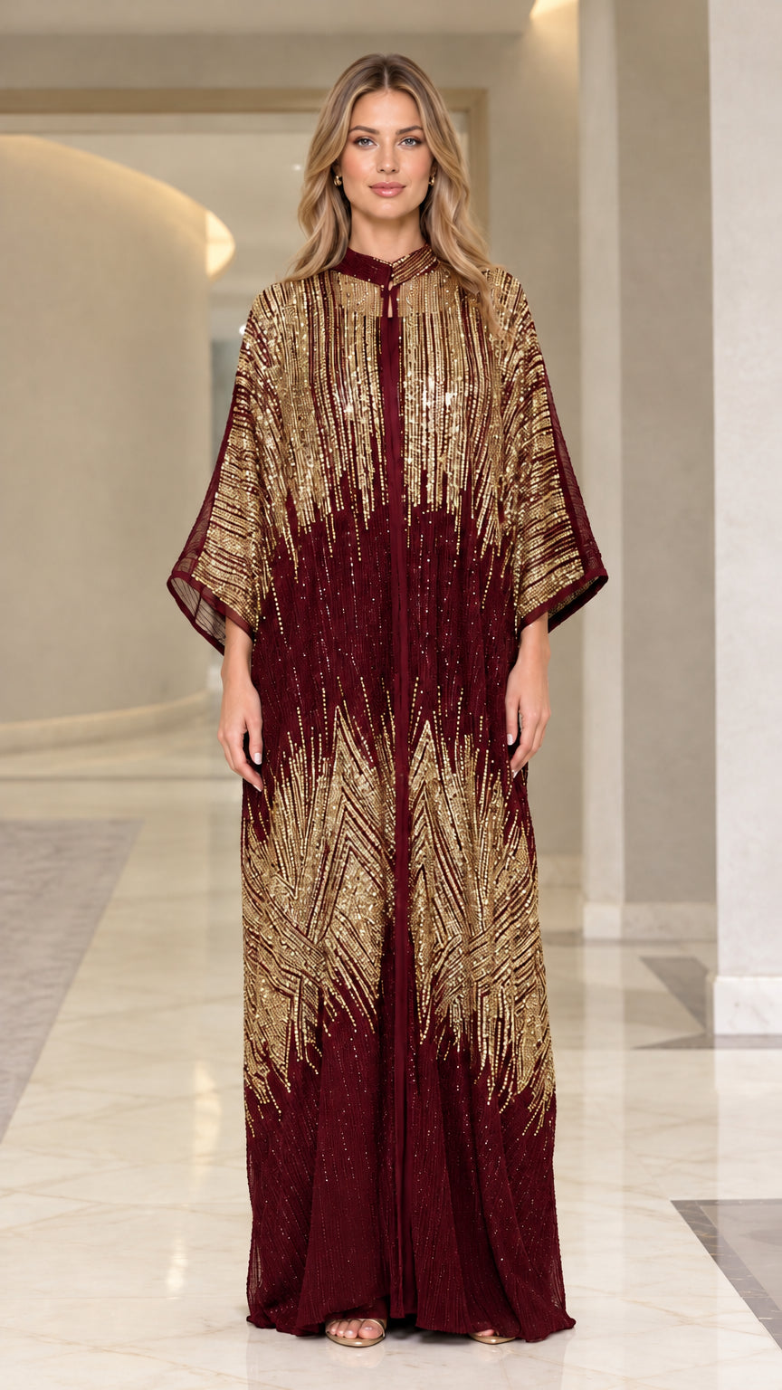 Front view of woman wearing deep burgundy wine sequin kaftan maxi dress