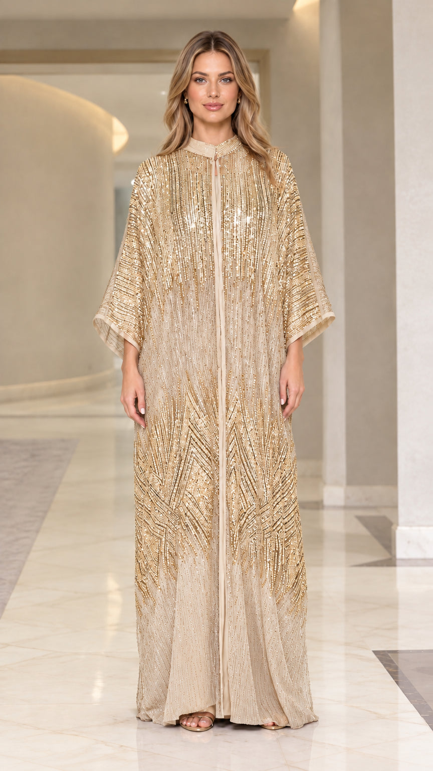 Front view of woman wearing champagne beige sequin floor-length kaftan dress