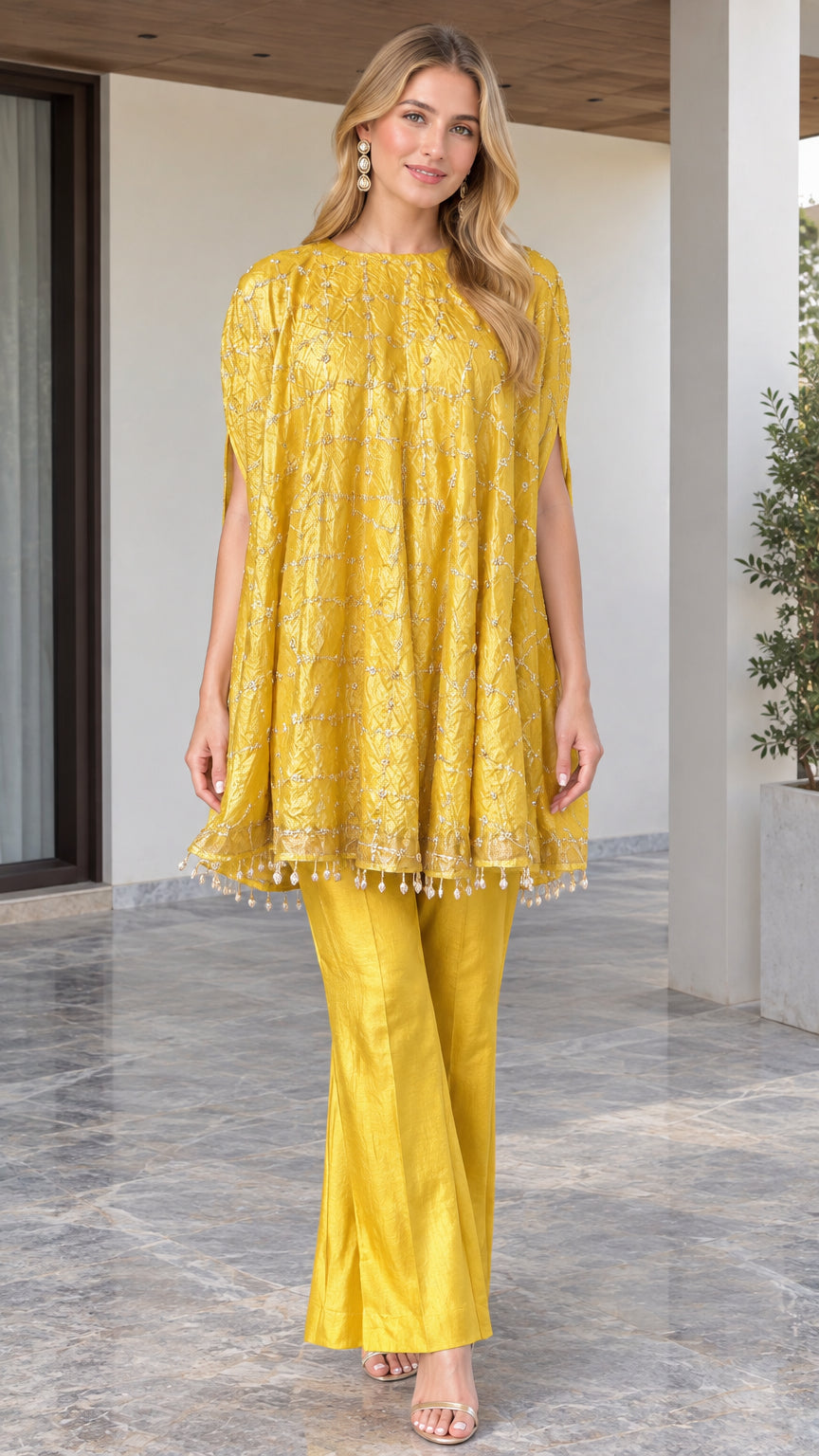 Yellow embroidered cape tunic and flared trousers two-piece set front view