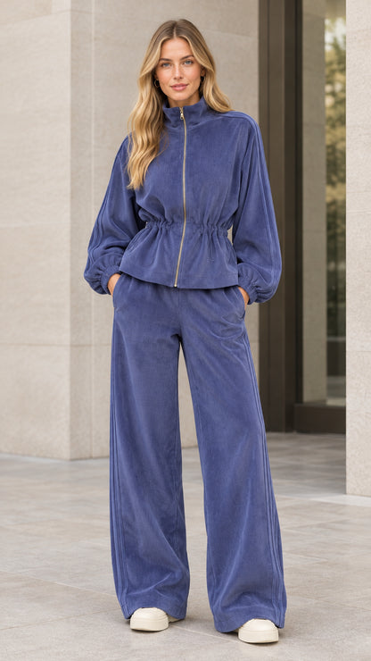 Front view of woman wearing slate blue corduroy zip jacket and wide leg pants set