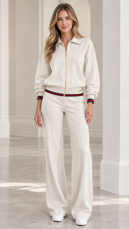 Full front view of women's cream collared zip-up tracksuit set with wide-leg pants