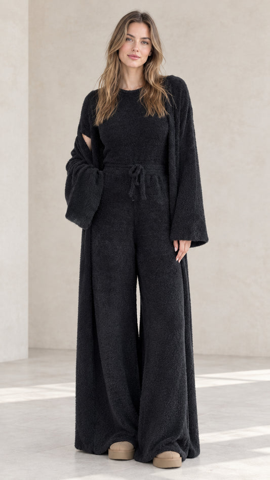 Women's black 3-piece fuzzy knit loungewear set with cardigan and wide leg pants - front view