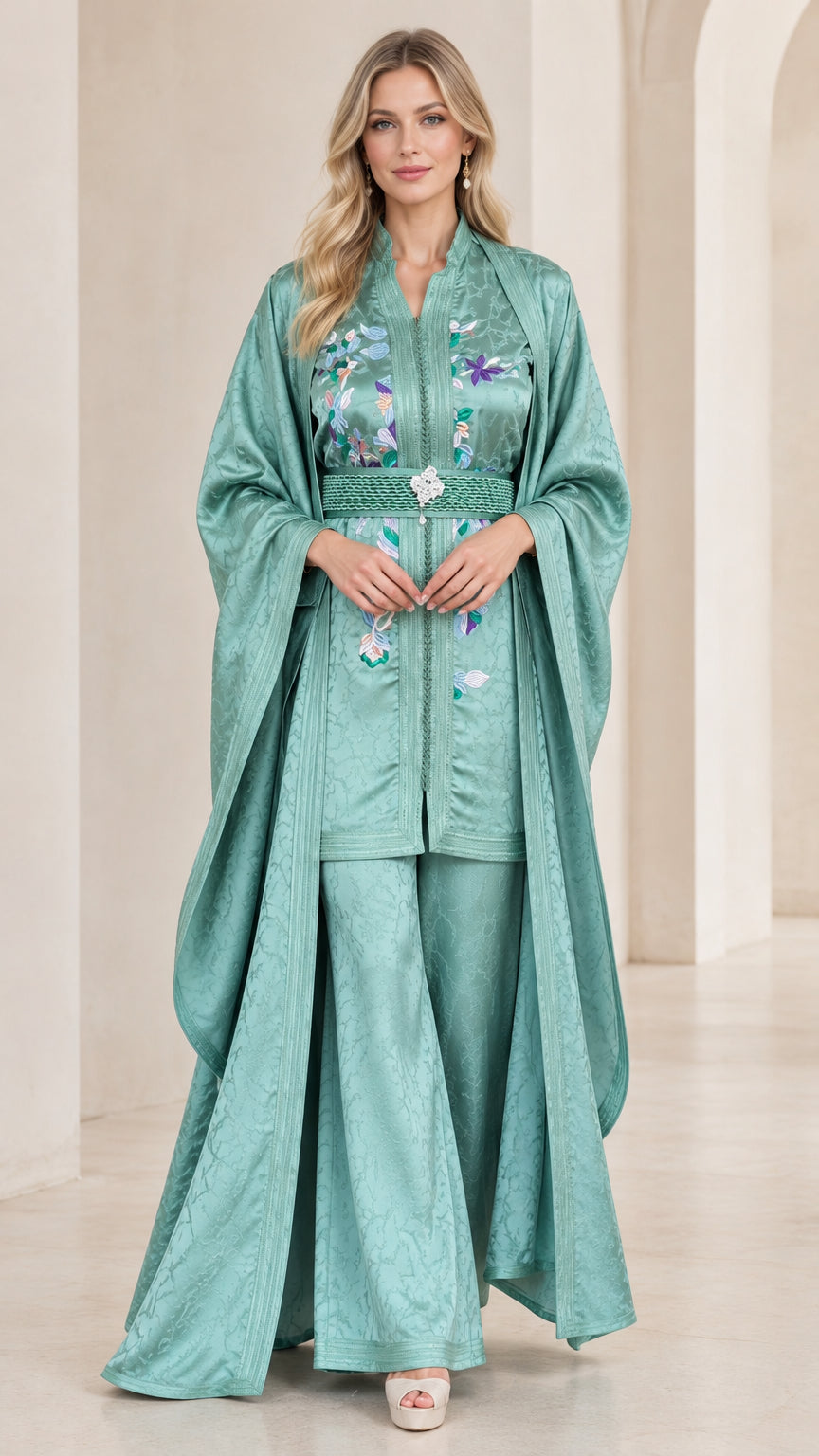 Front view of model wearing Sage Green 3-piece embroidered jacquard kaftan pant set with cape