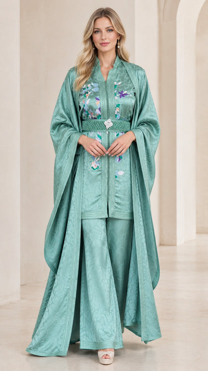 Front view of model wearing Sage Green 3-piece embroidered jacquard kaftan pant set with cape