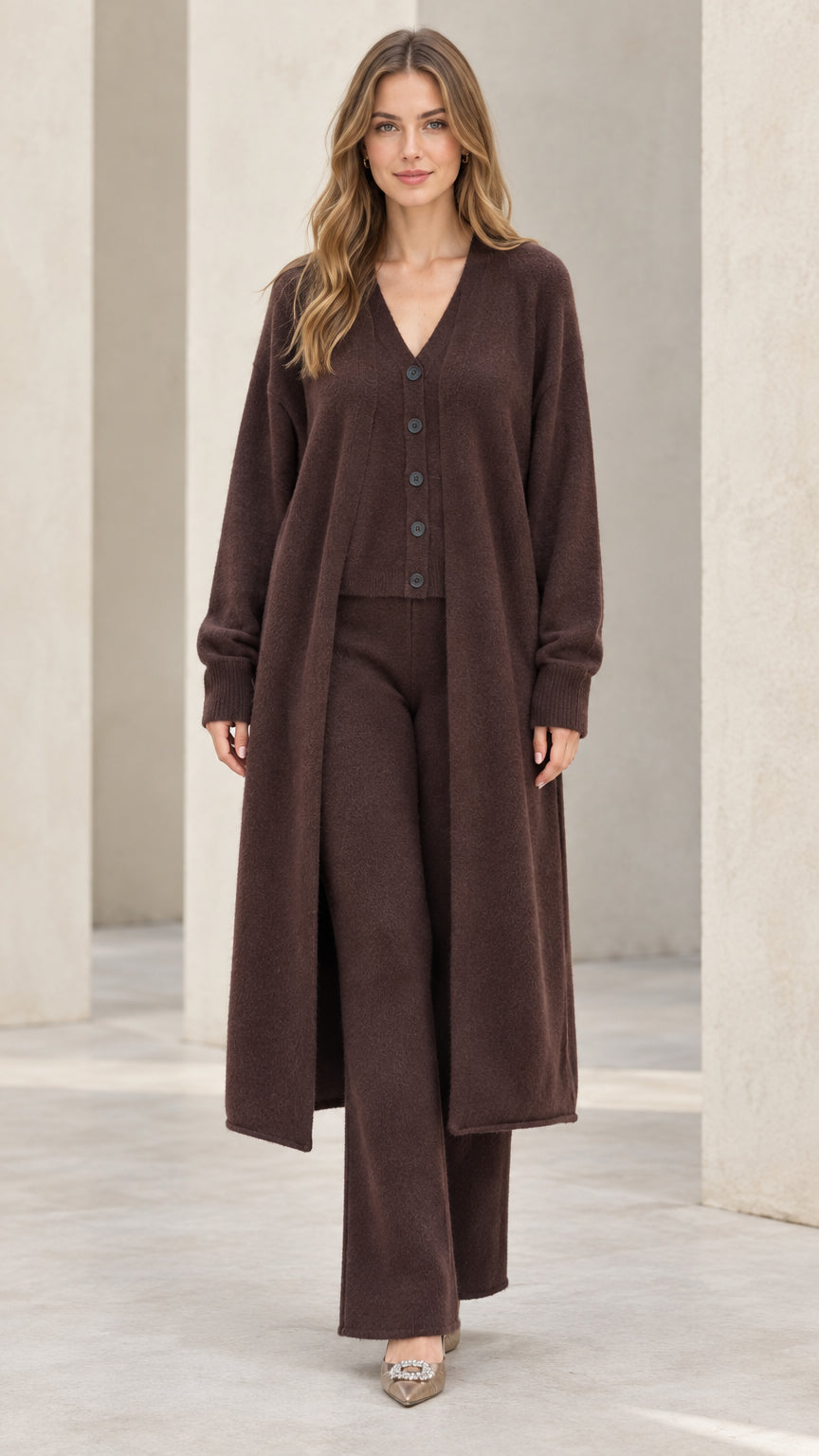 Front full-length view of model wearing chocolate brown 3-piece knit cardigan and pants set