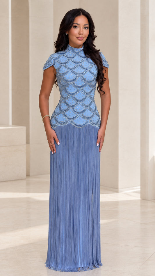 Front view of woman wearing Dusty Blue beaded scallop bodice maxi dress with fringe skirt