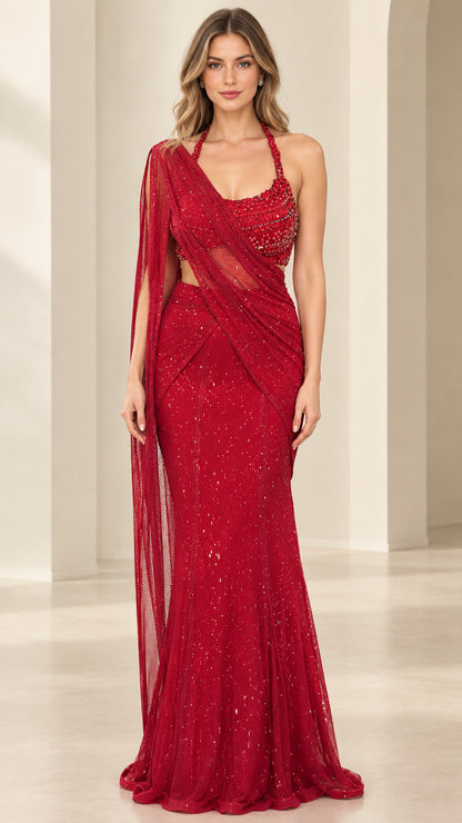 Model wearing red sequin beaded halter evening gown with draped sash front view