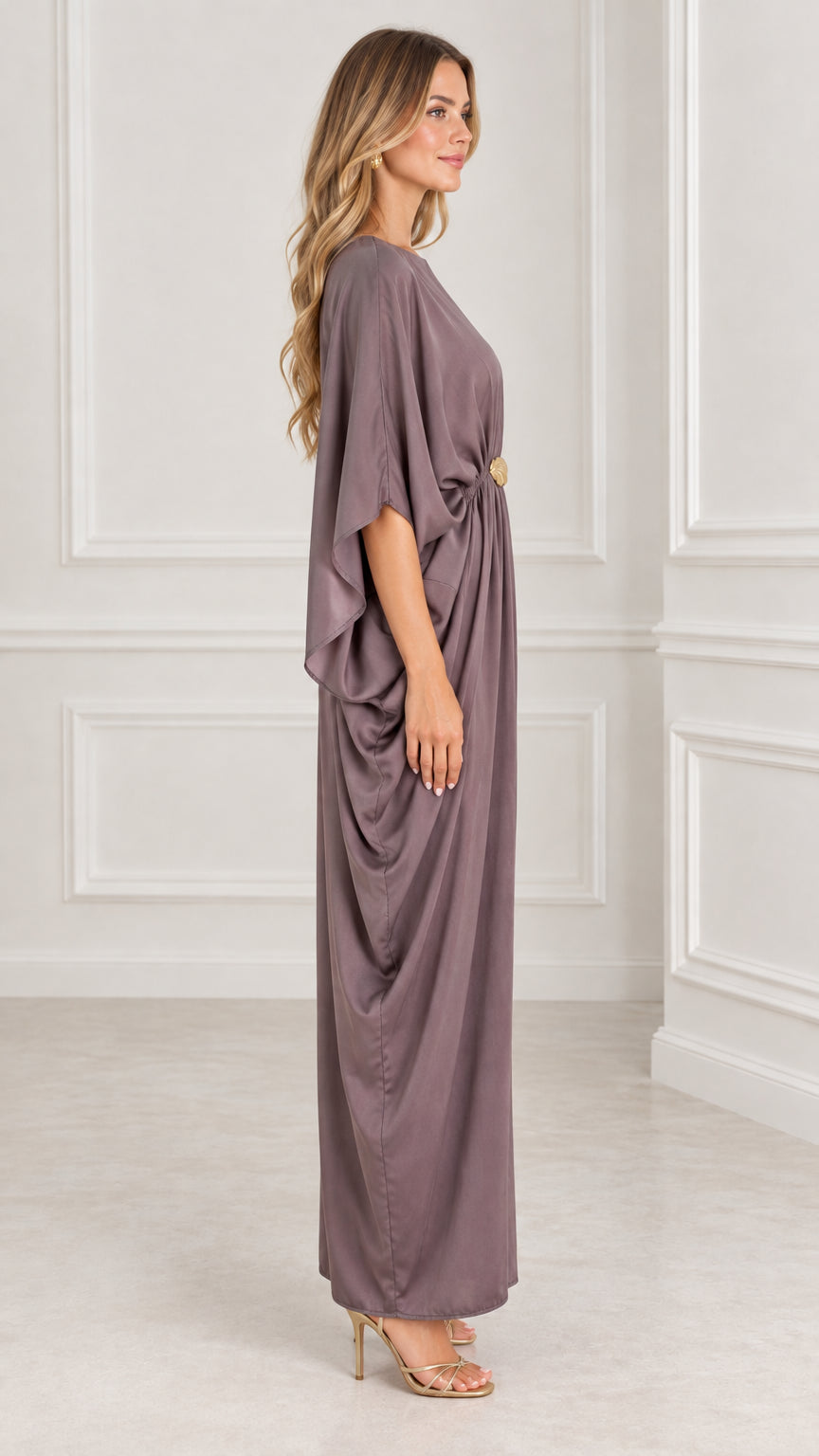 Side profile of model in mauve batwing sleeve kaftan maxi dress