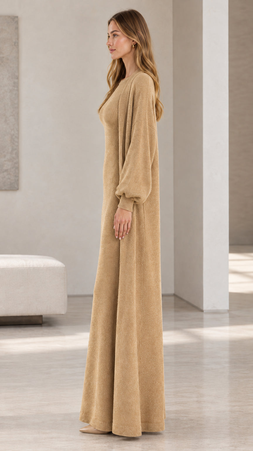 Side profile view of woman modeling camel ribbed knit dress and open duster cardigan