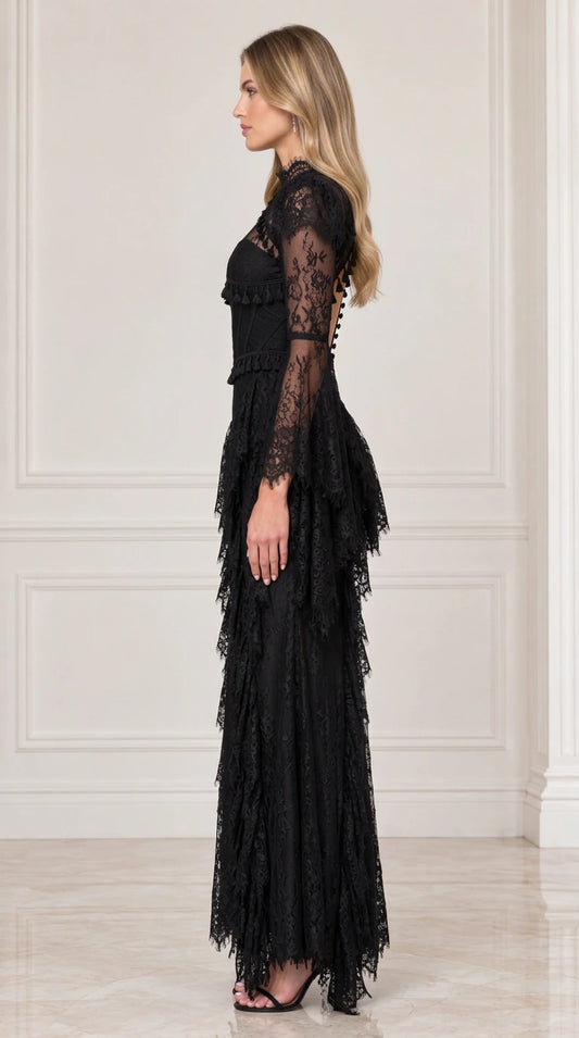 Side profile of black lace formal evening gown showing tiered skirt and silhouette