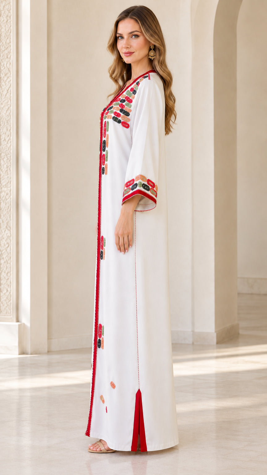 Side profile view of woman wearing white long embroidered modest kaftan dress
