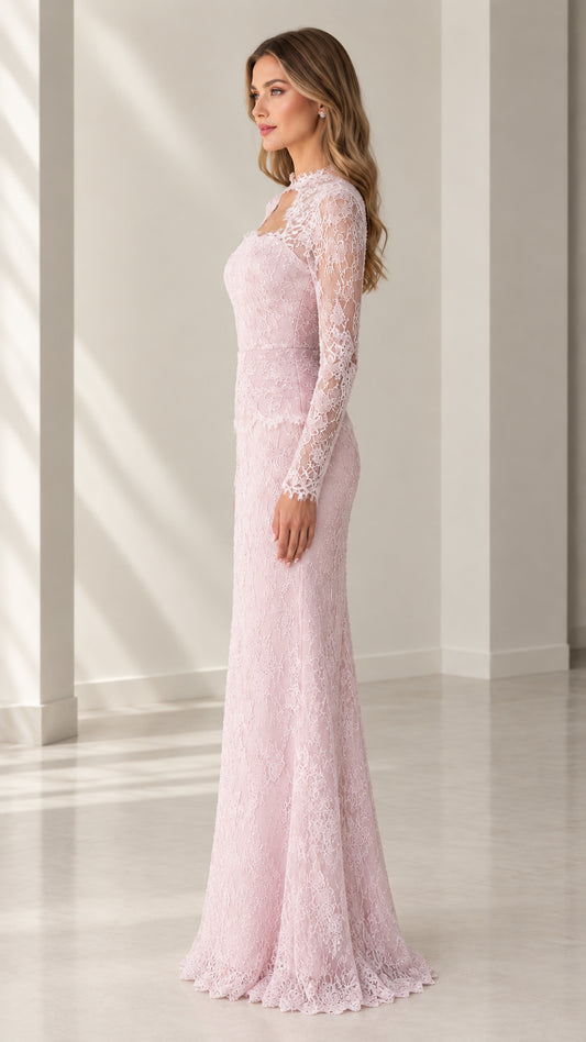 Side profile of woman in blush pink floor length lace gown