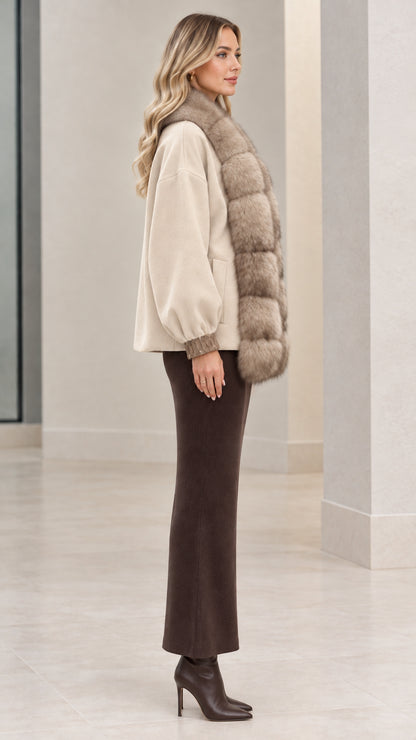 Side profile view of beige faux fur trim jacket showing sleeve drape