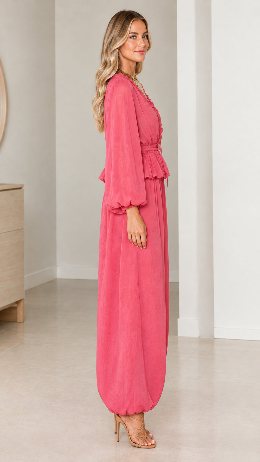 Side profile of model wearing Rose Pink matching two-piece set