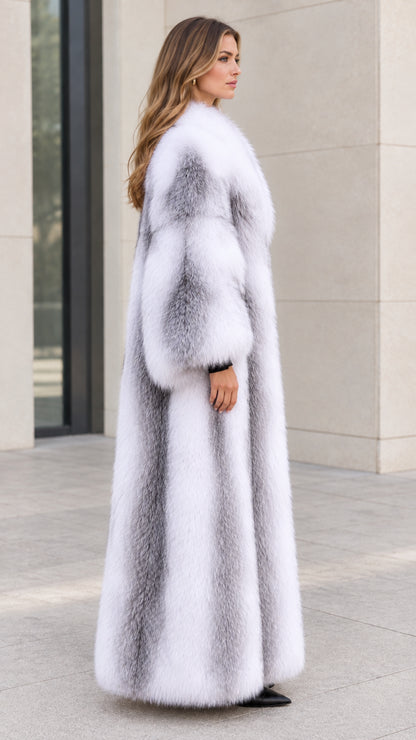 Side profile of model wearing a Silver White long faux fur maxi coat