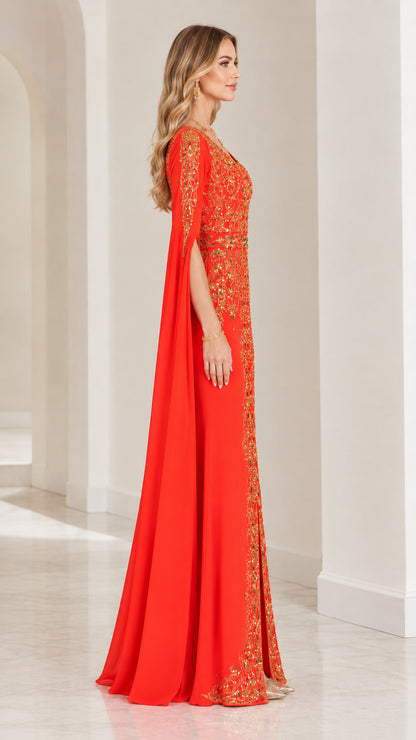 Side profile view of model in red floor-length gown highlighting the draped cape sleeves
