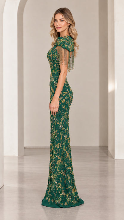 Emerald green embellished maxi dress with shoulder fringe side profile view