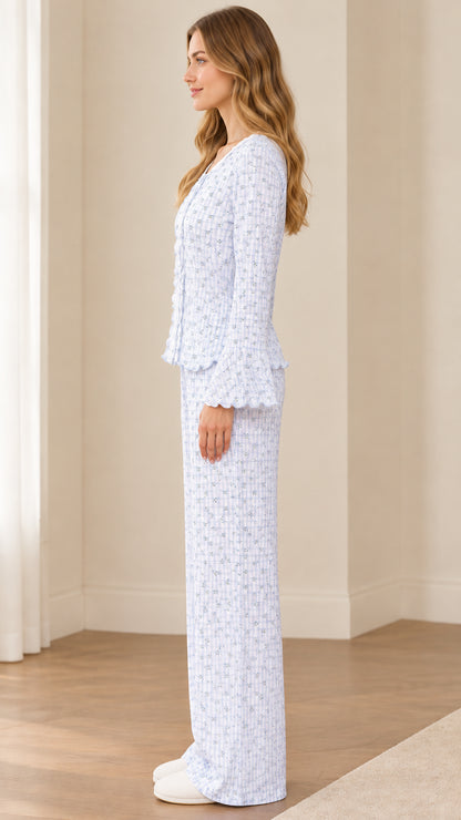 Side profile of model wearing Light Blue floral lace-trim pajama set