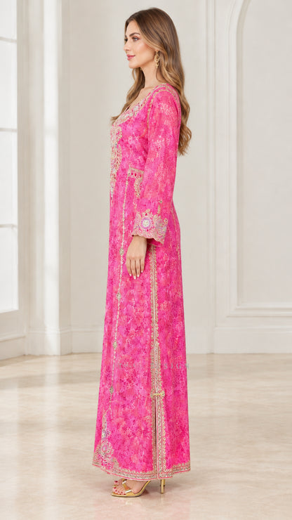 Side profile of woman wearing Fuchsia Pink long sleeve embroidered evening dress