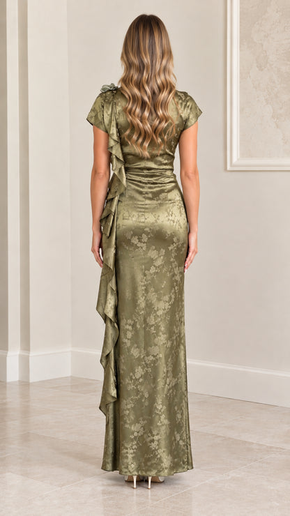 Back view of model wearing Sage Green satin jacquard cap sleeve maxi gown