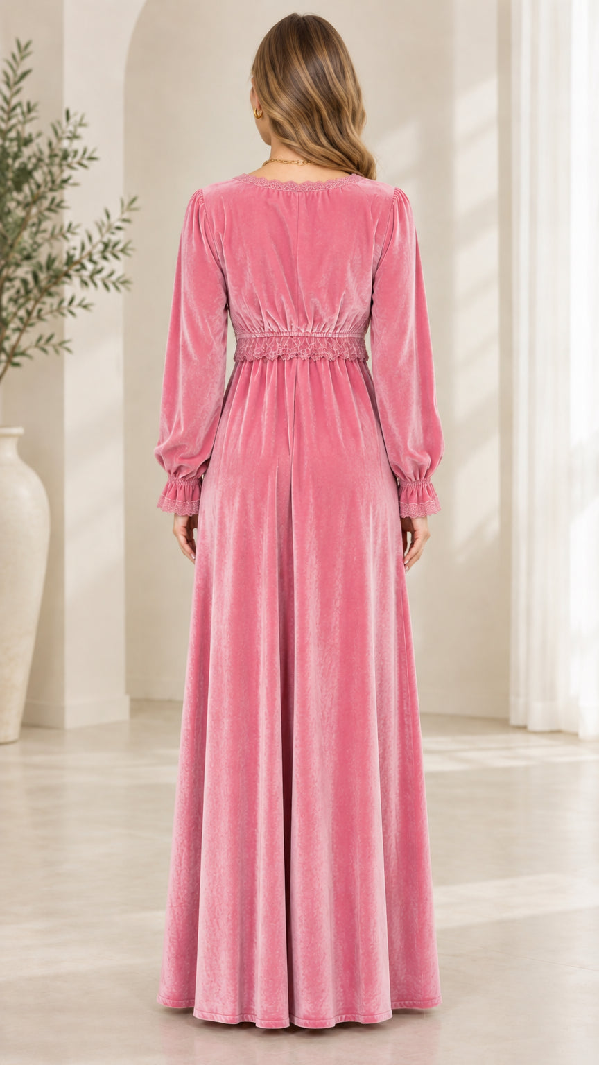 Back view of dusty pink velvet A-line maxi dress