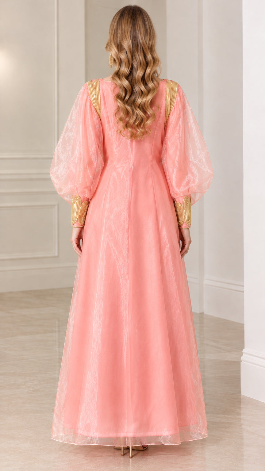 Back view of model wearing pink floor-length evening maxi dress