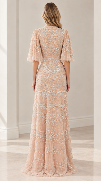 Back view of champagne embellished formal evening gown