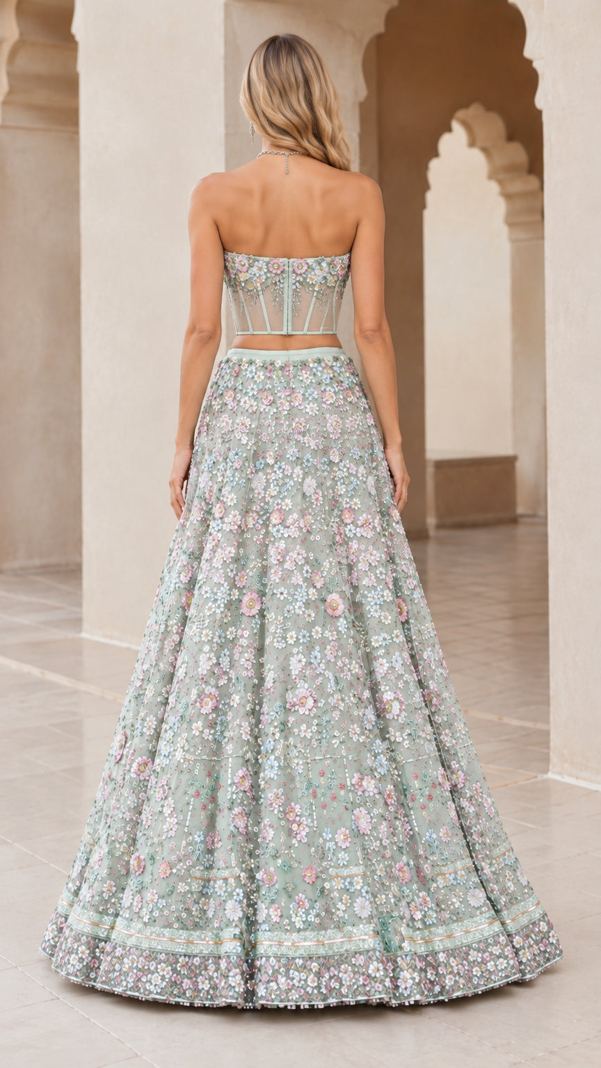 Back view of model showcasing the sheer boned corset back and flared floor-length skirt
