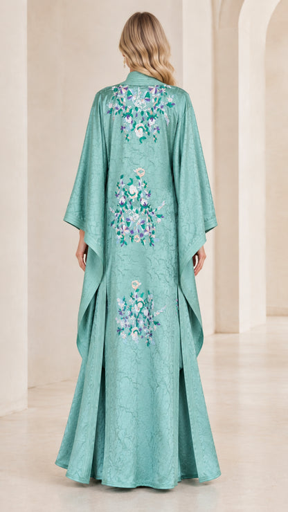 Back view of Sage Green kaftan set showcasing delicate floral embroidery on the duster cape