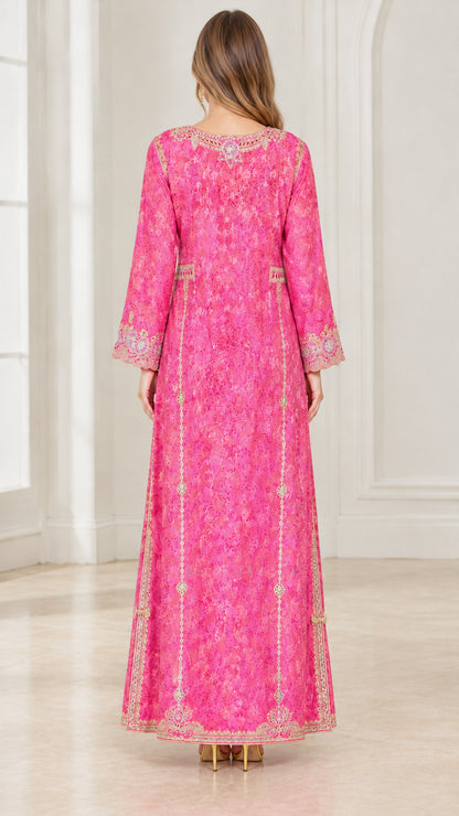 Back view of woman wearing Fuchsia Pink embroidered formal maxi gown