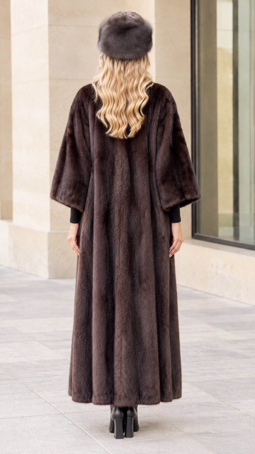 Back view of women's floor-length faux fur coat in espresso brown